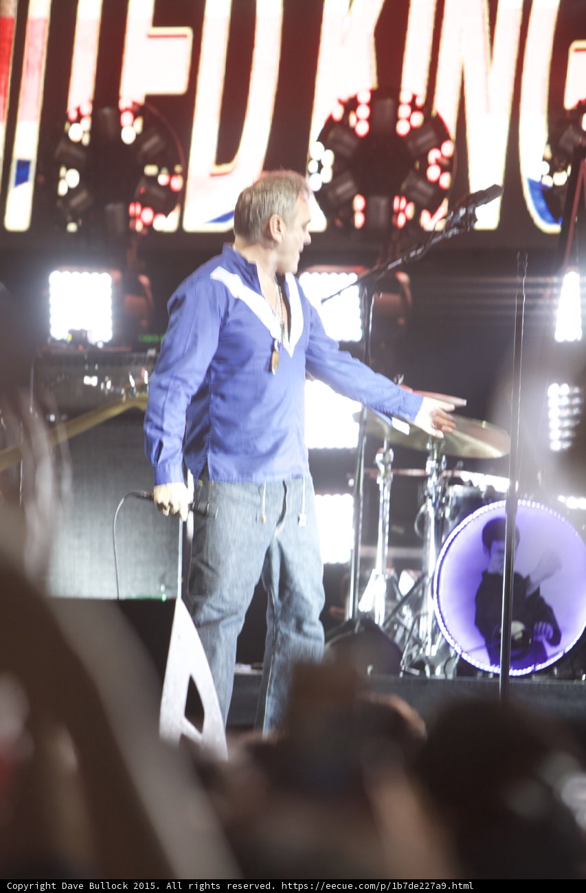Morrissey Reaching Toward Drums Blue Shirt LED Head Young Morrissey Silhouette UNITED KINGDOM Screen Crowd