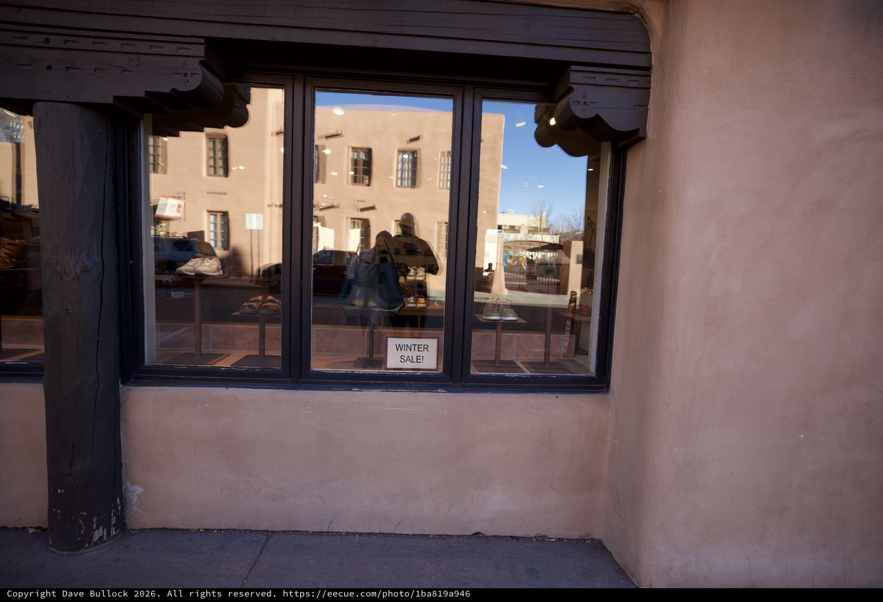Adobe Storefront Window Display at Sunset in Santa Fe