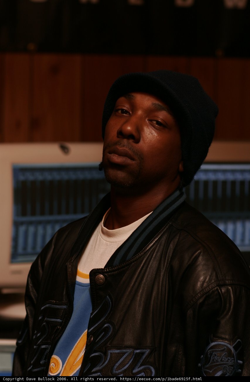 MC Eiht in a Black Leather Coat
