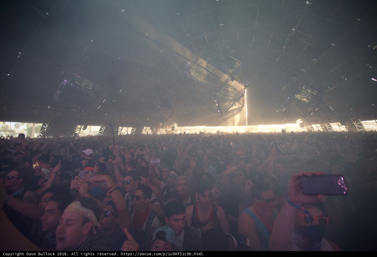 Smoke-Infused Concert Crowd