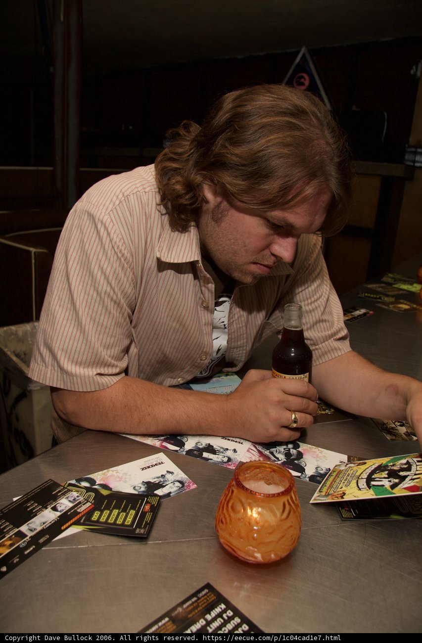 Man Reading Magazine with Ring