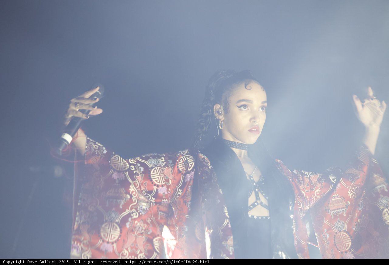 FKA twigs Arms Spread Red Brocade Kimono Black Choker Baby Hairs Hoop Earrings Expressive Hands
