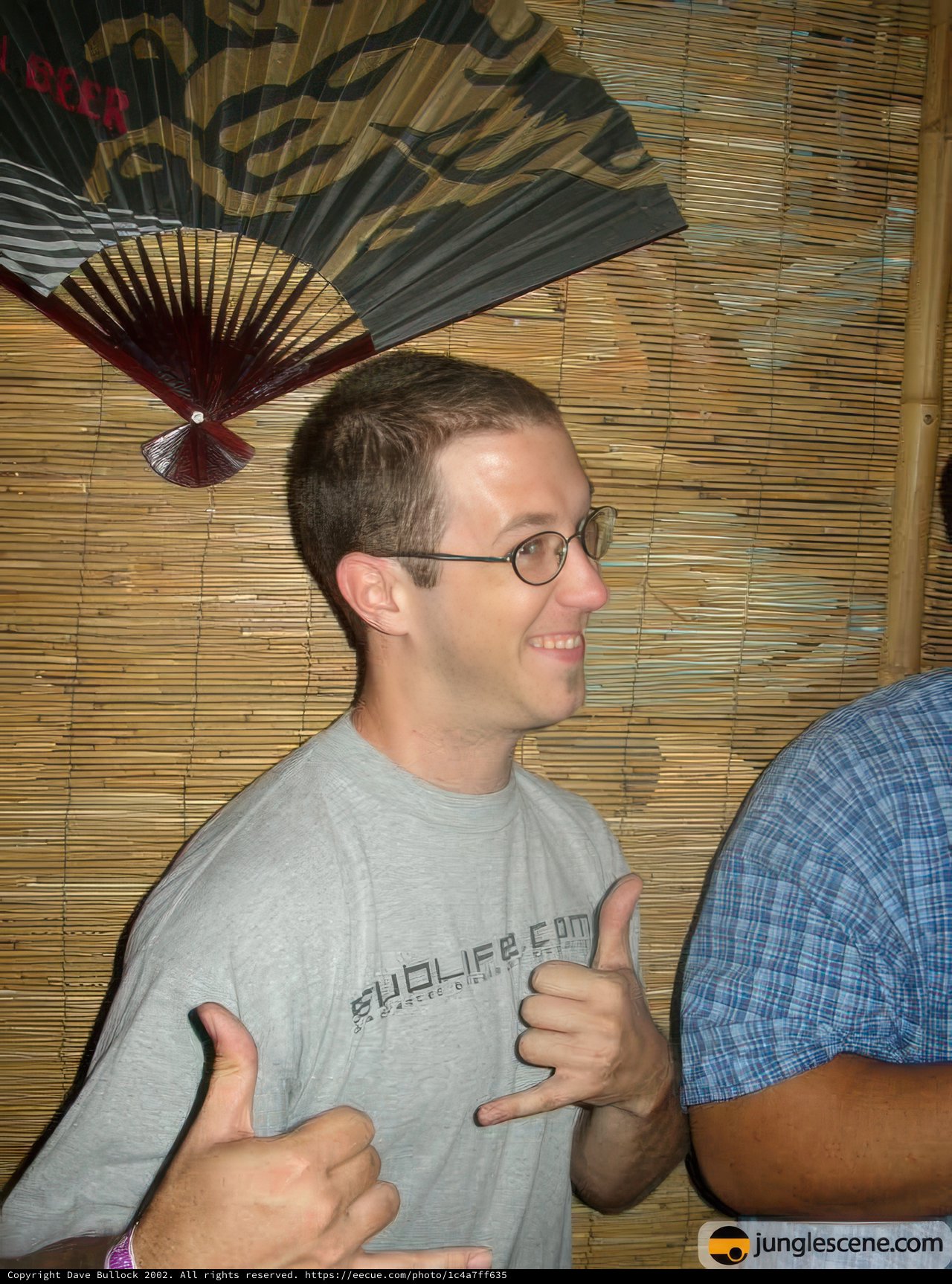 Two Men Giving a Thumbs Up