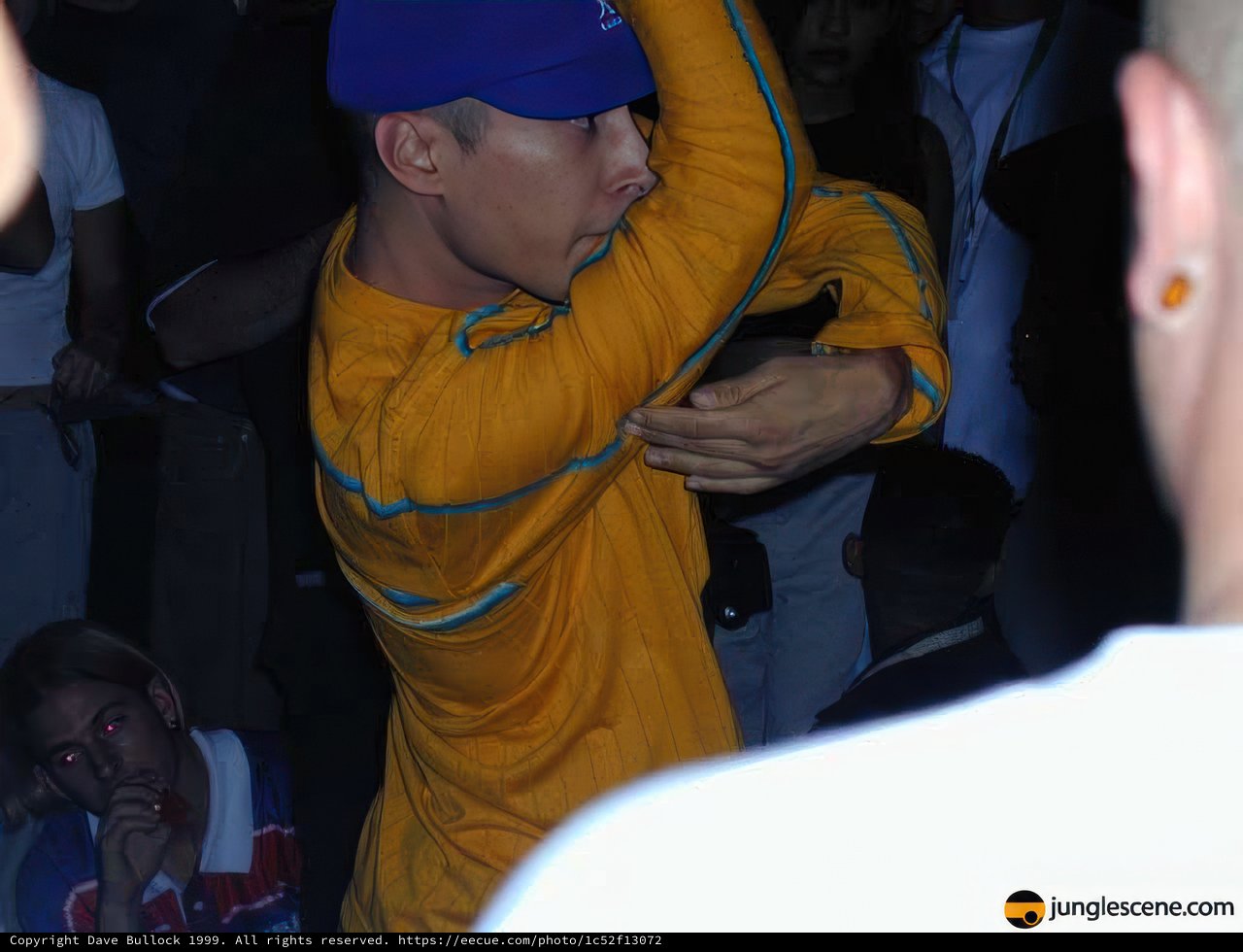 Man in Yellow Baseball Cap