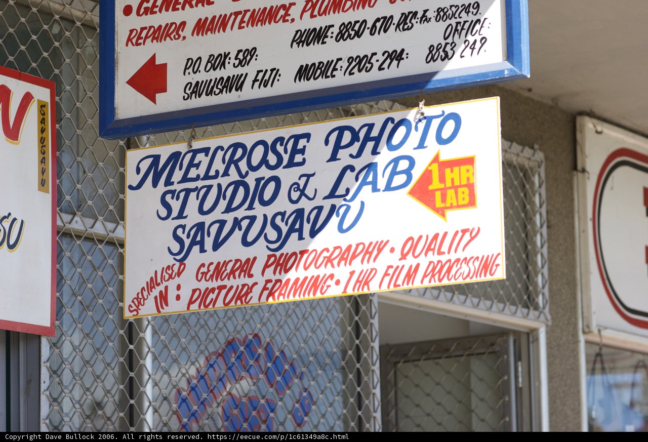 Sign on Chain Link Fence