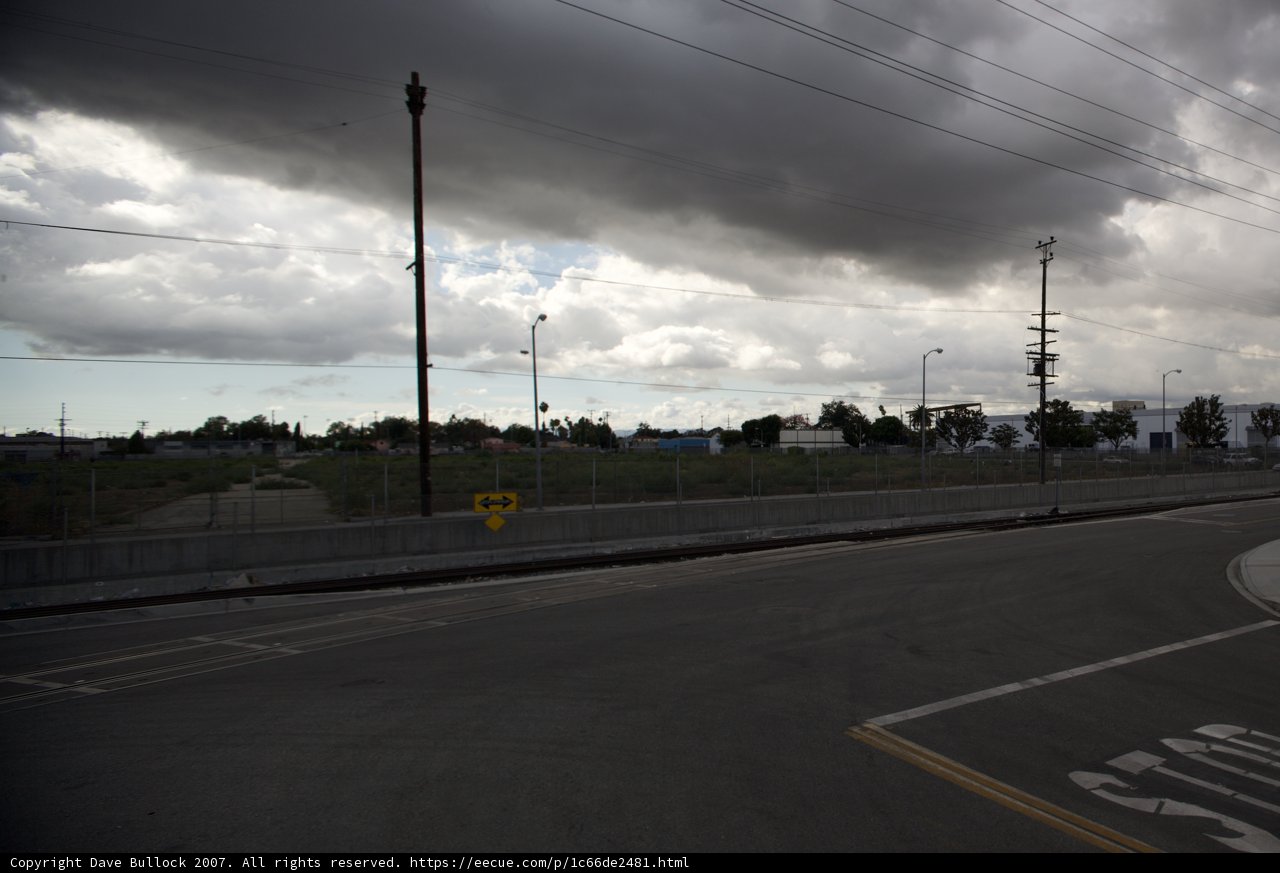 Dark Clouds Hovering Over the Freeway