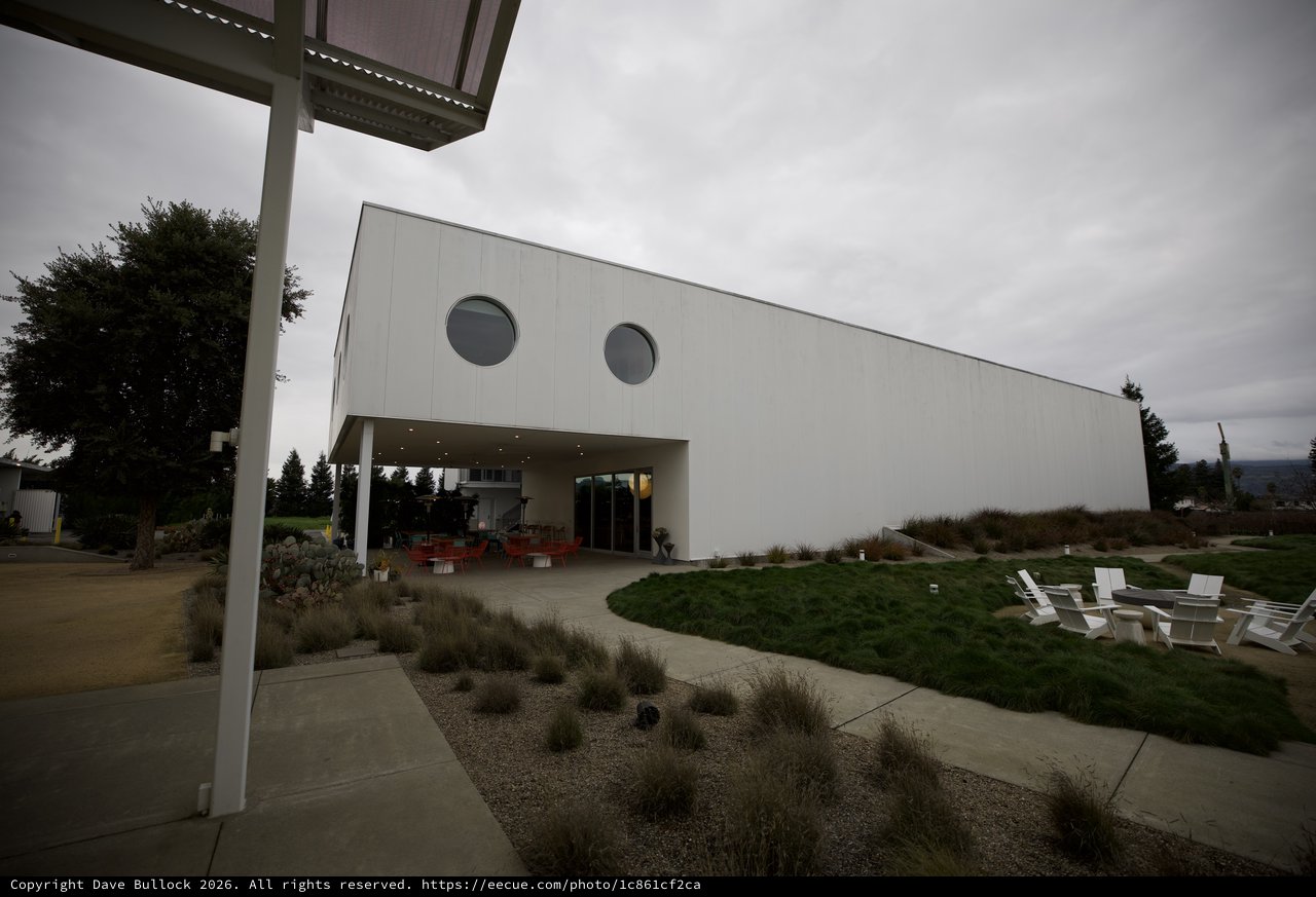 Modern Winery Architecture Under Cloudy Skies