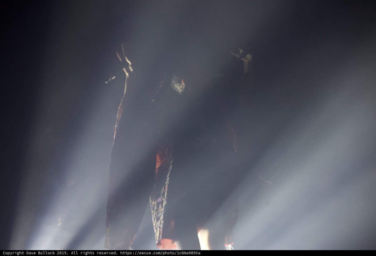 FKA twigs Silhouette Abstract White Light Beams Haze Red Kimono Microphone Dramatic Stage Production