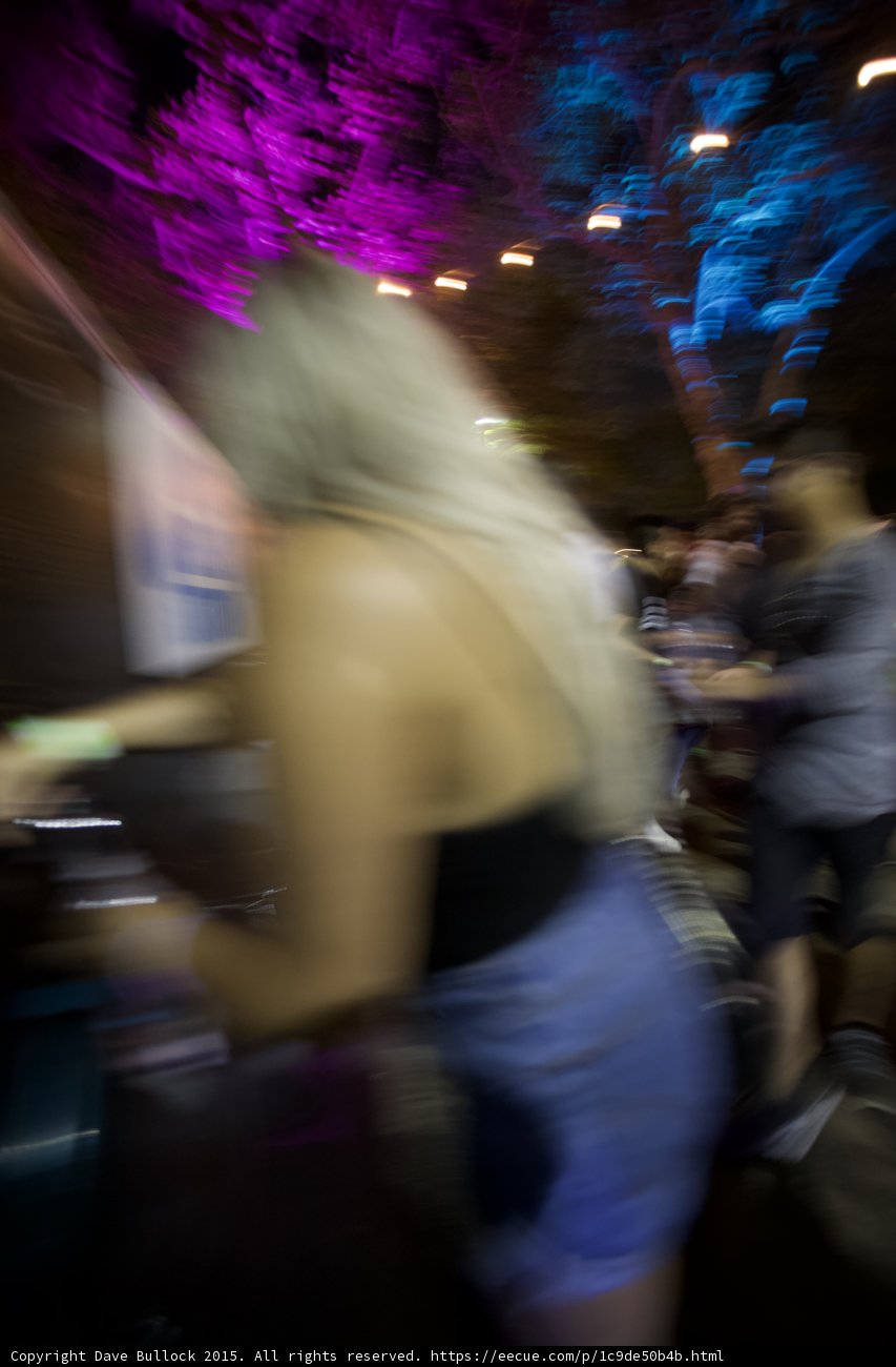 FYF Fest Motion Blur Blonde Woman Walking Festival Grounds Purple Blue Lights Night