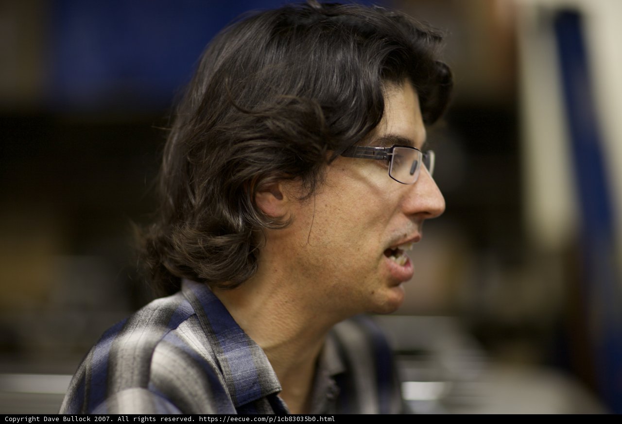 Smiling Man with Glasses