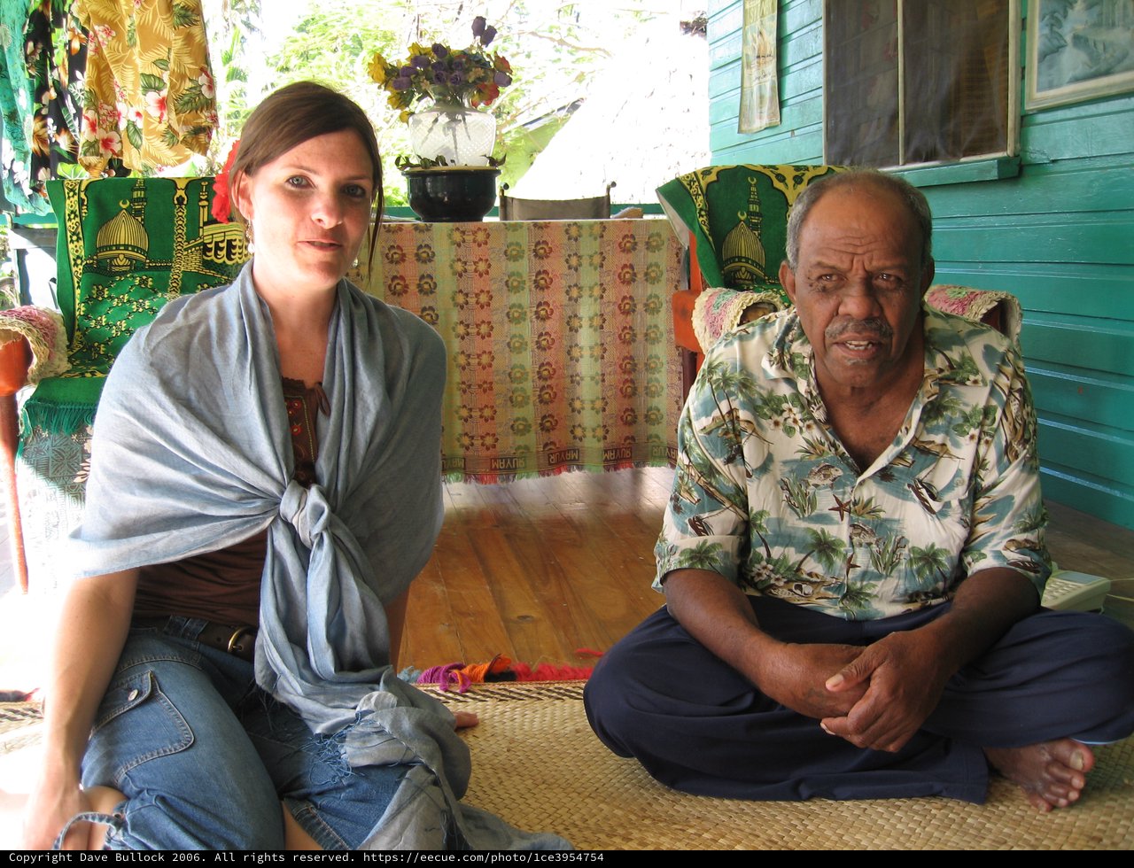 Cross-Cultural Meeting on Fijian Village Floor