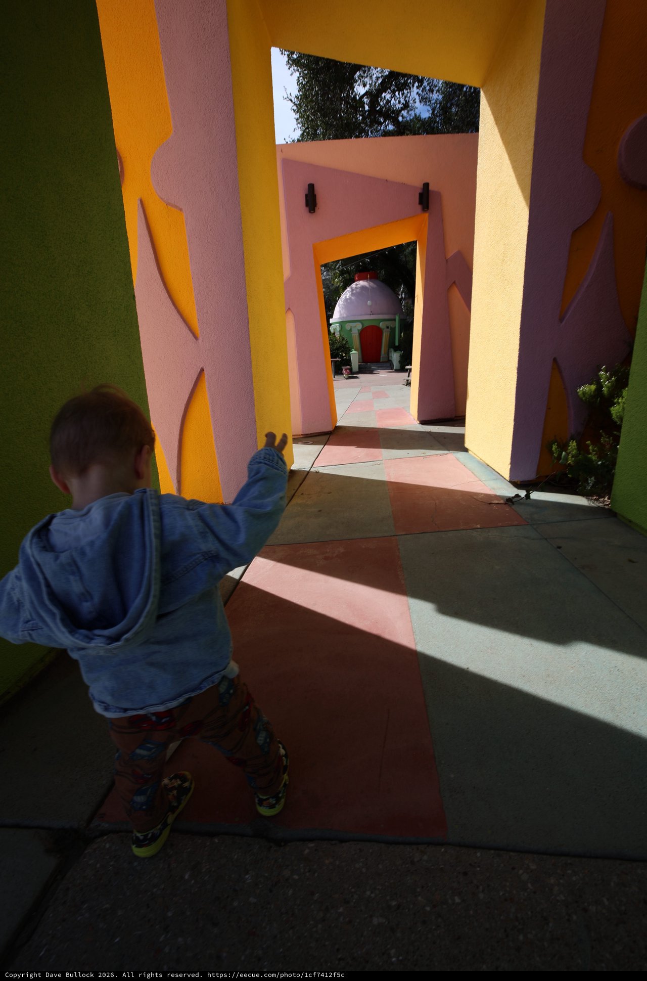 Child Exploring Colorful Architecture at Fantasyland