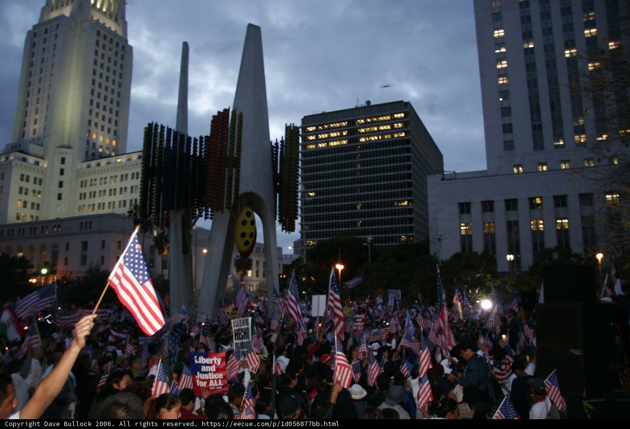 Patriotic Crowd at City Building