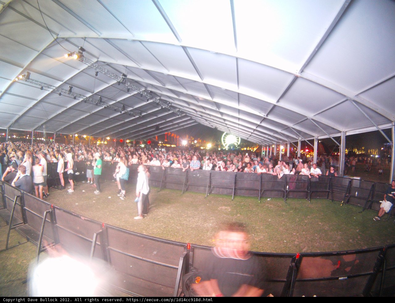 Massive Crowd Gathers for Concert in Outdoor Tent