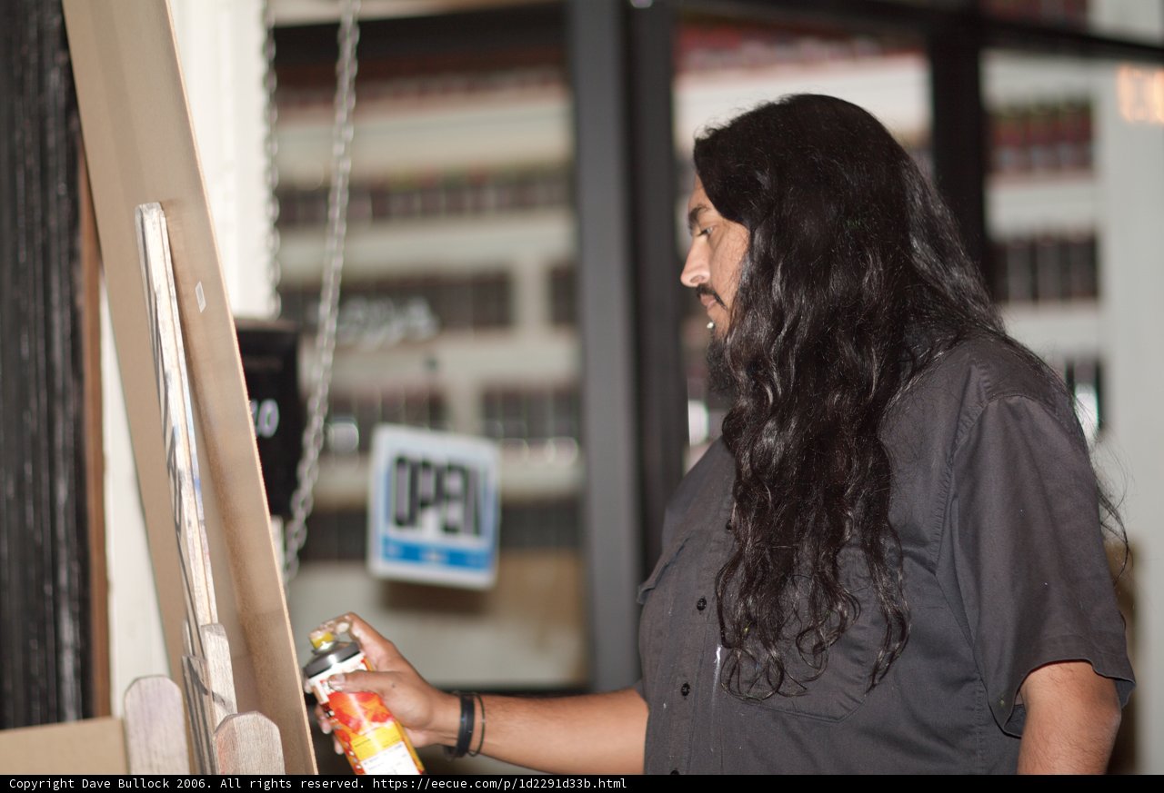 Long-Haired Man with a Tin in the Pantry