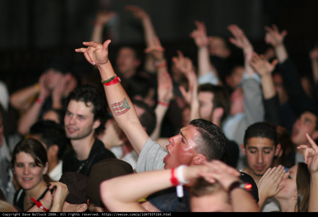 Tattooed Man in the Urban Crowd