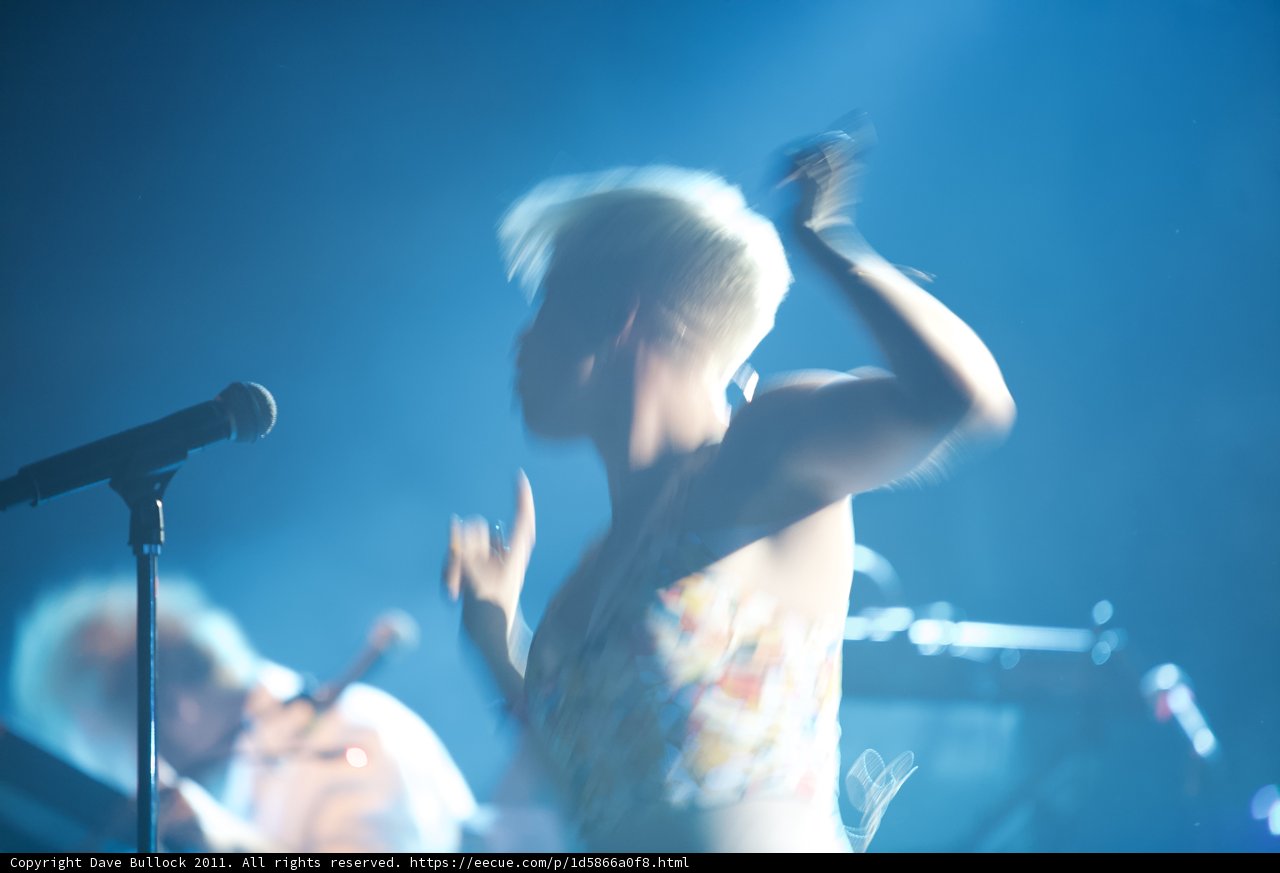 Electrifying Concert Performance by Blonde Female Singer