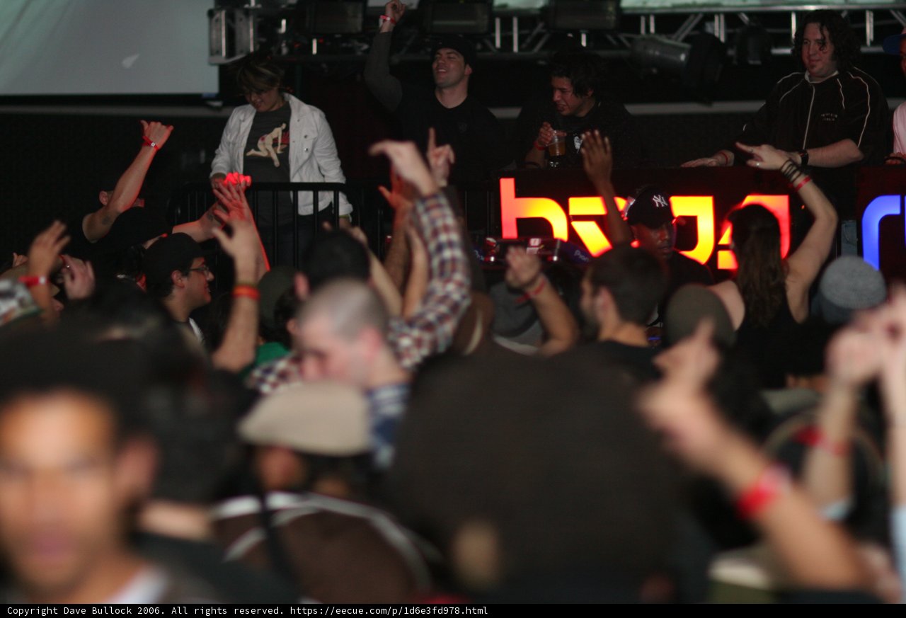 Urban concert crowd with hands up