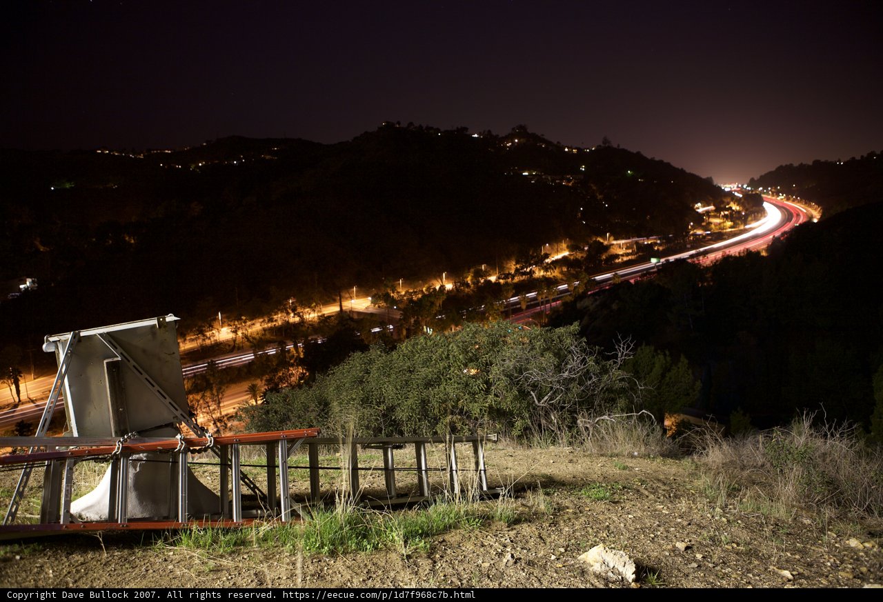 Night Skyline with Freeway and Hill