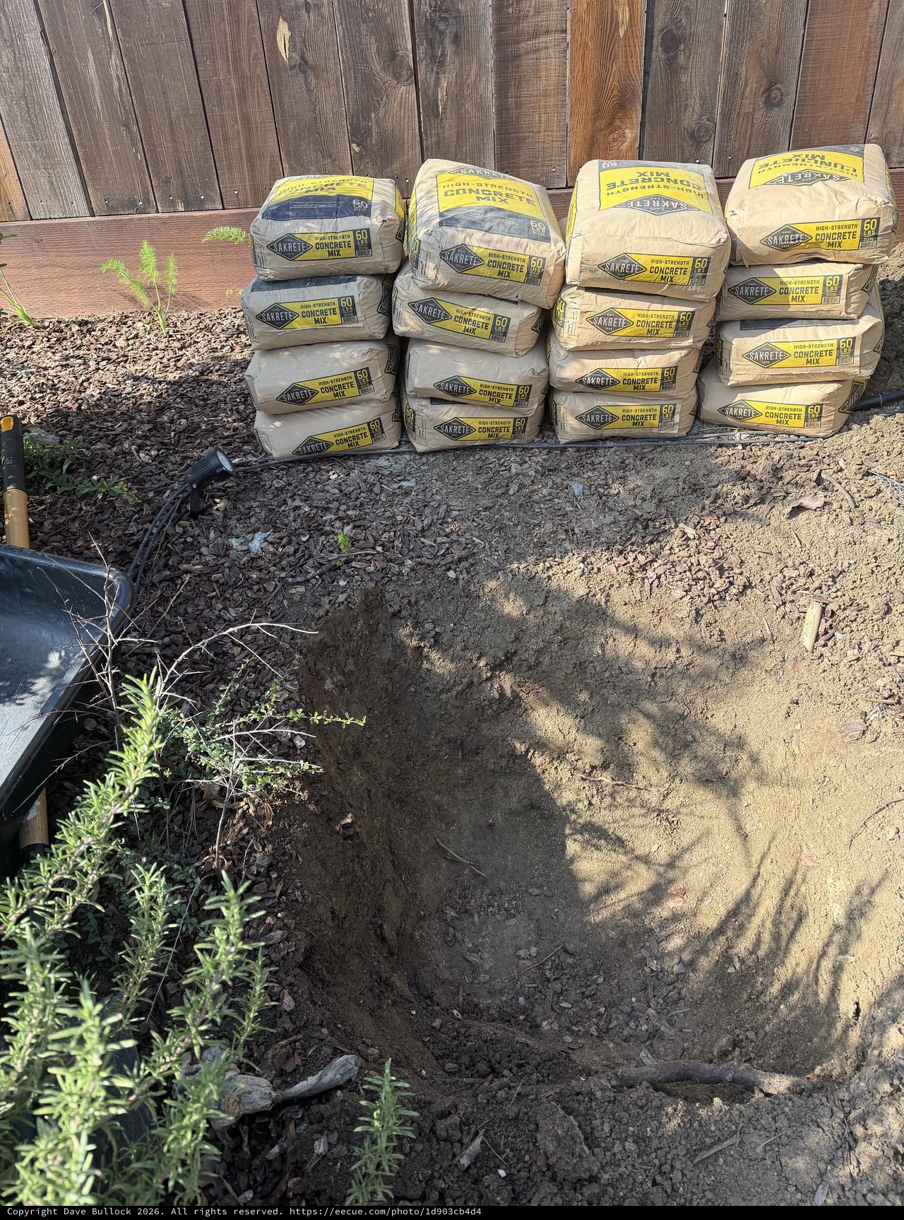Sakrete Concrete Mix Bags Stacked for Backyard Project