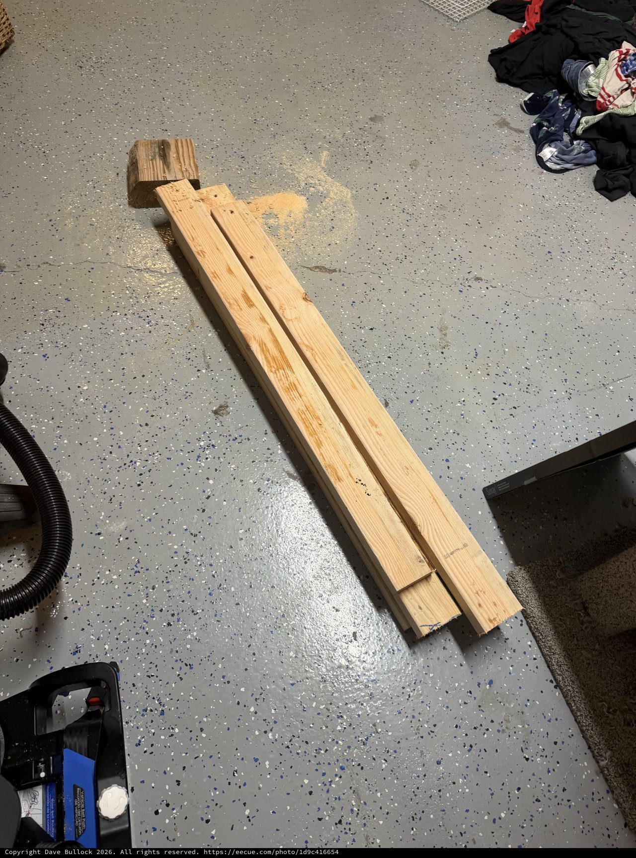 Wooden Planks and Block Arrangement on Garage Floor