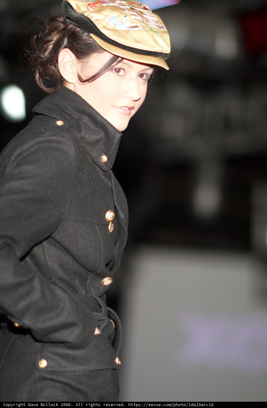 Stylish Woman in Military-Style Hat