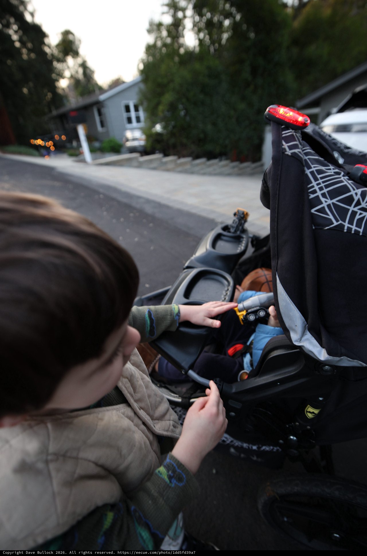 Evening Walk with Child in Stroller
