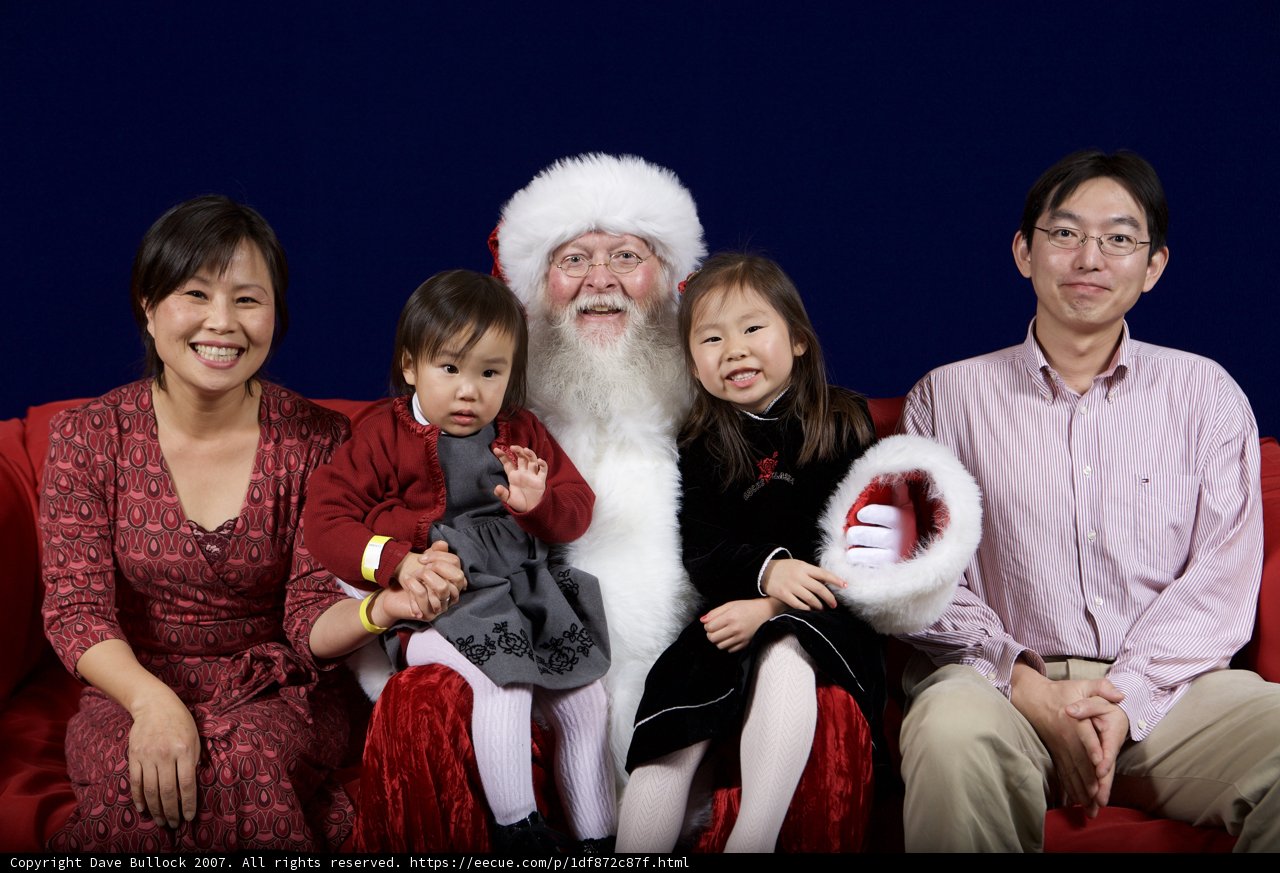 A Festive Family Photo with Santa Claus