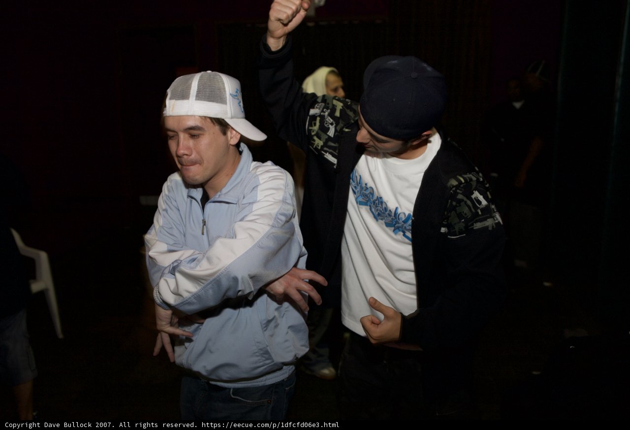 Dancing Duo In Baseball Caps