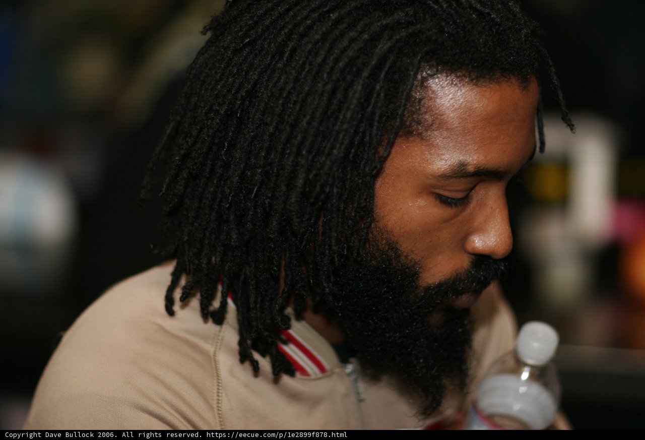 Dreadlocked Man with Water Bottle