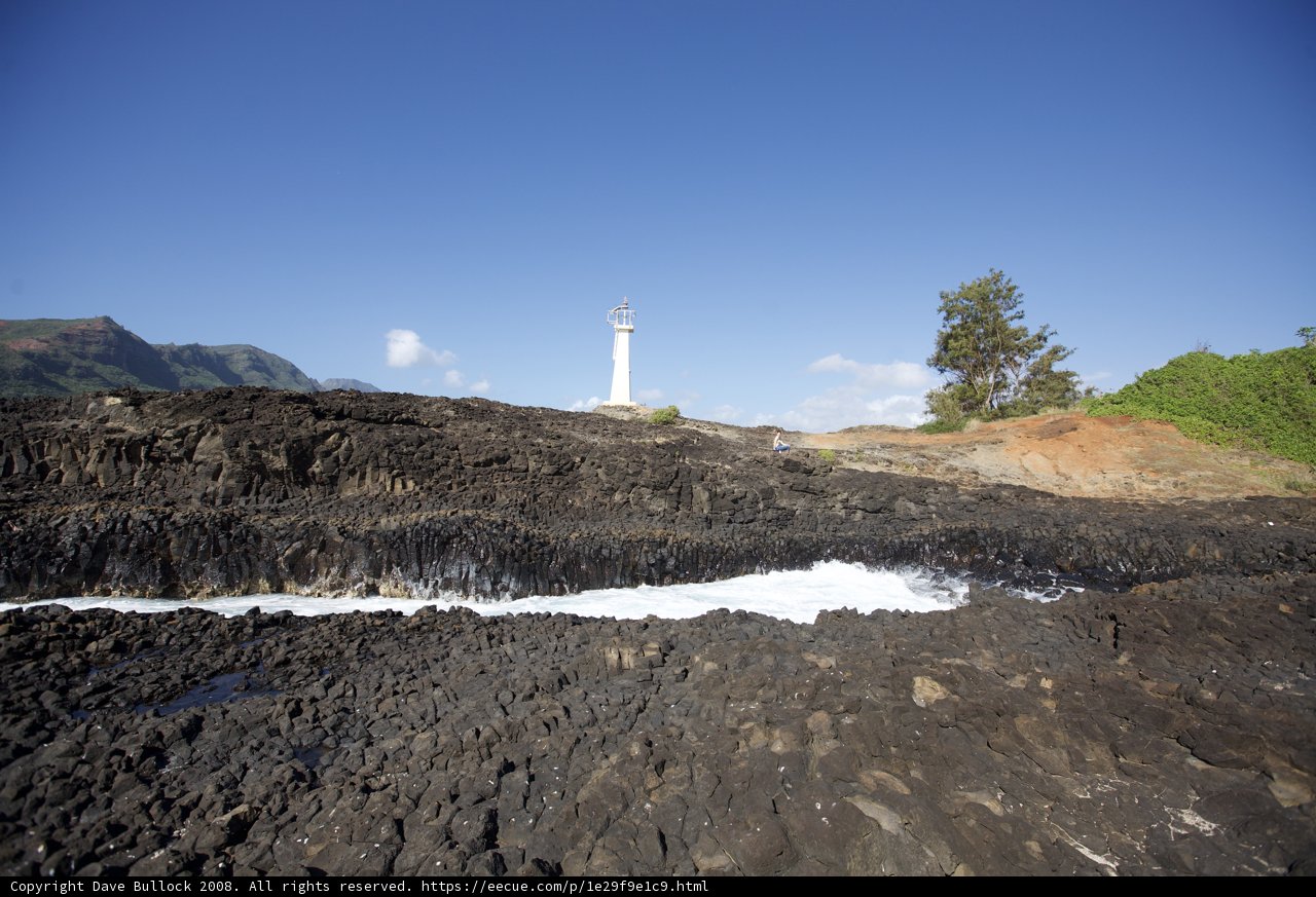 Majestic Lighthouse on the Rocky Shoreline