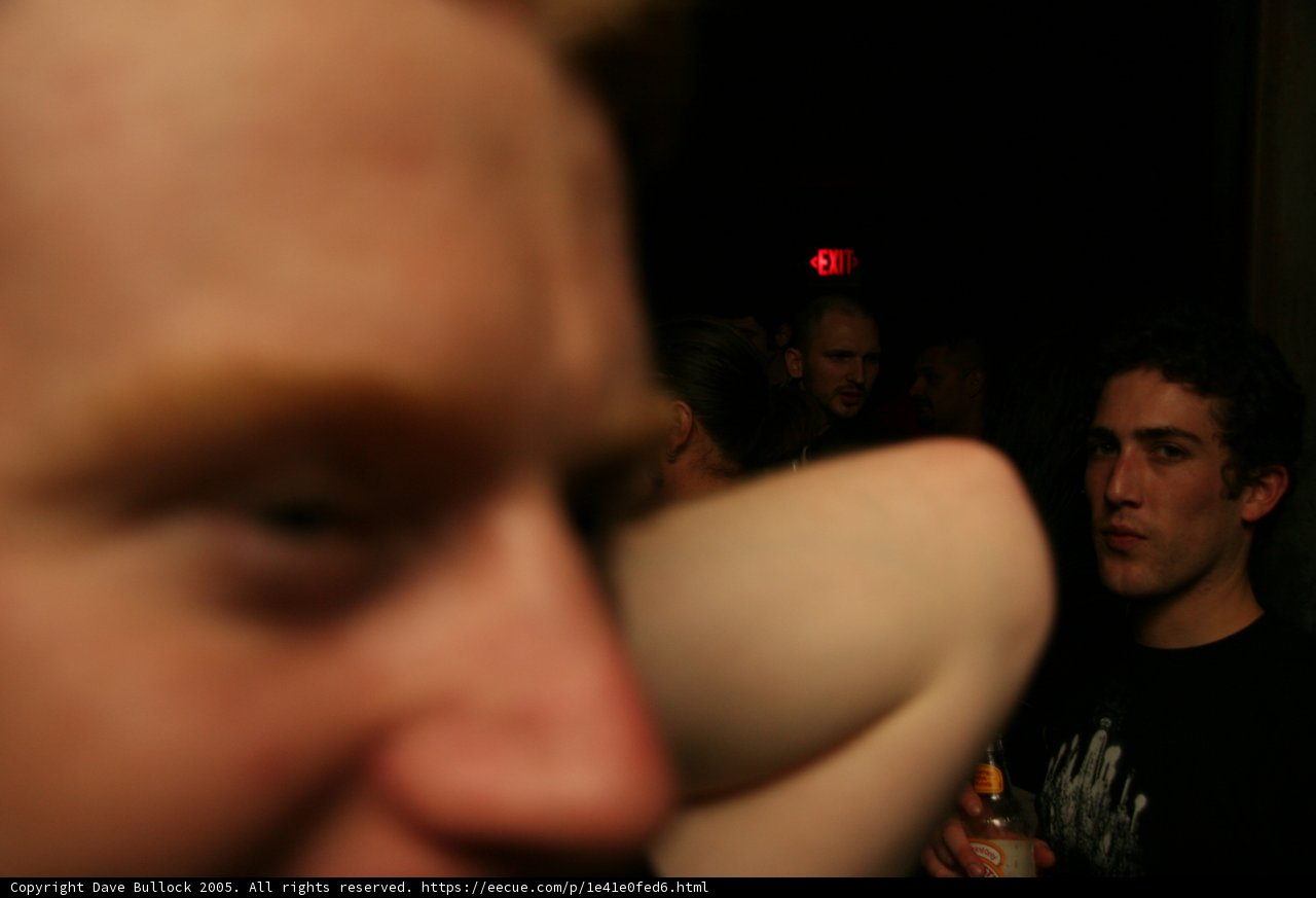 Red-Headed Man in Urban Night Club