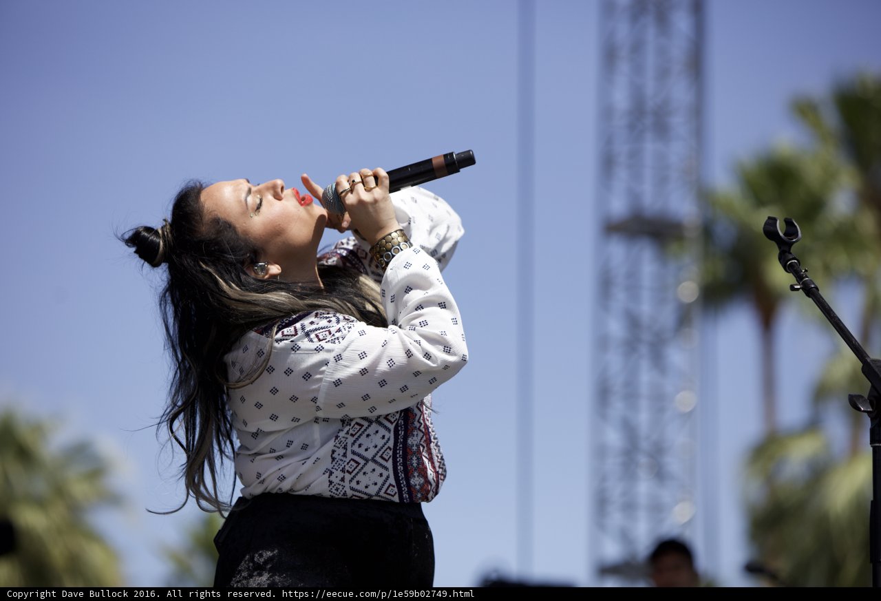 Woman Entertainer Belts Out a Tune