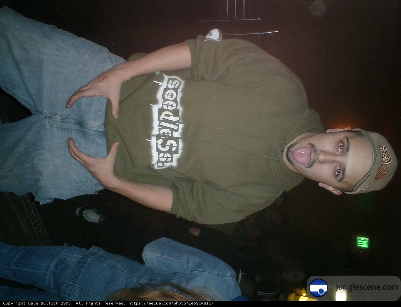 Urban Man in Green Sweatshirt