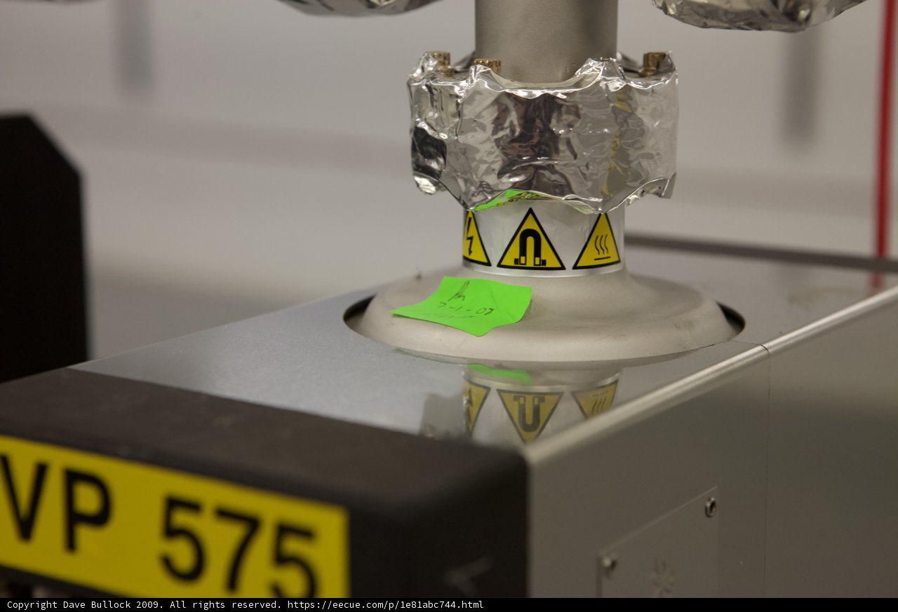 Aluminum Object with Green Sticker