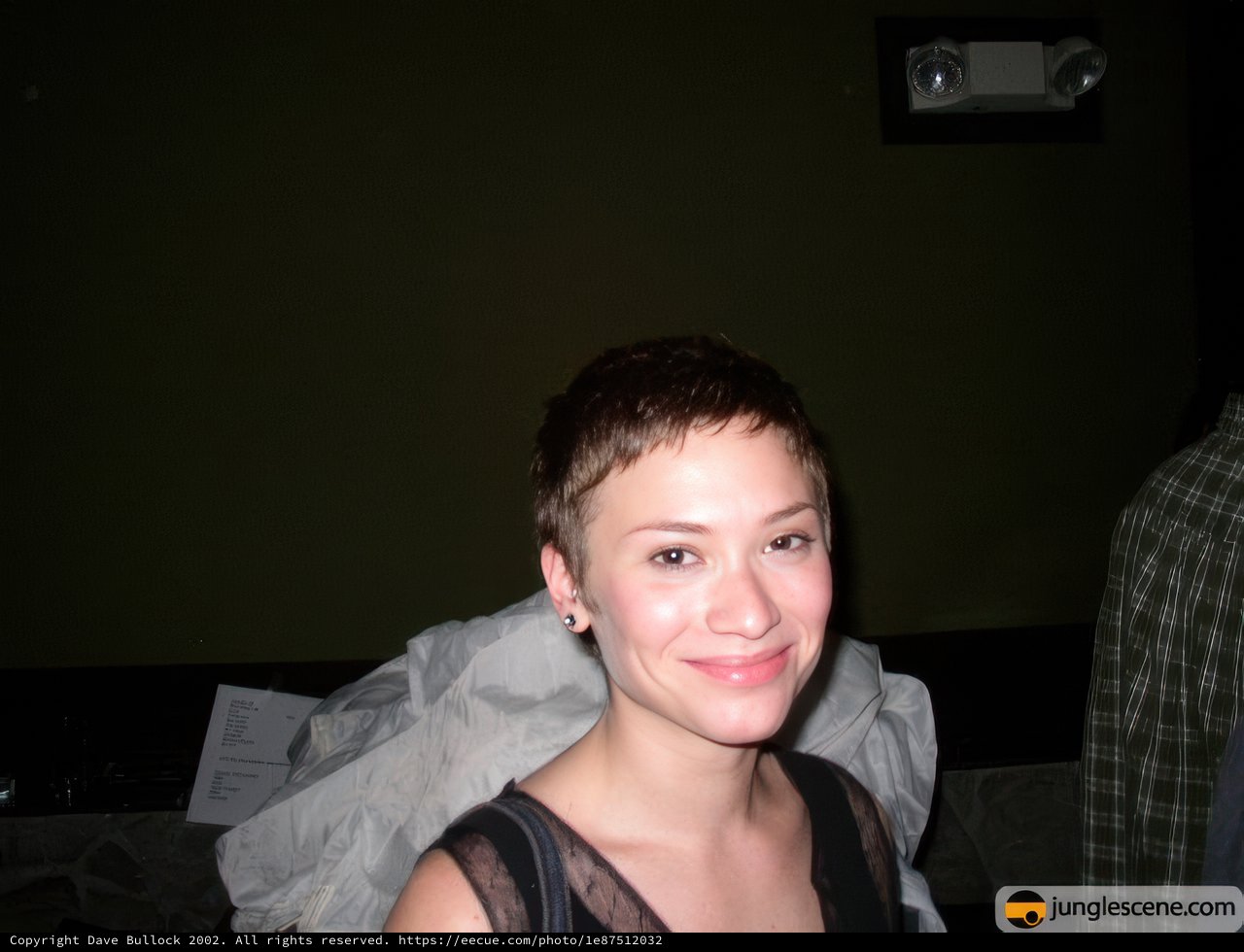 Smiling Portrait of a Short-Haired Woman