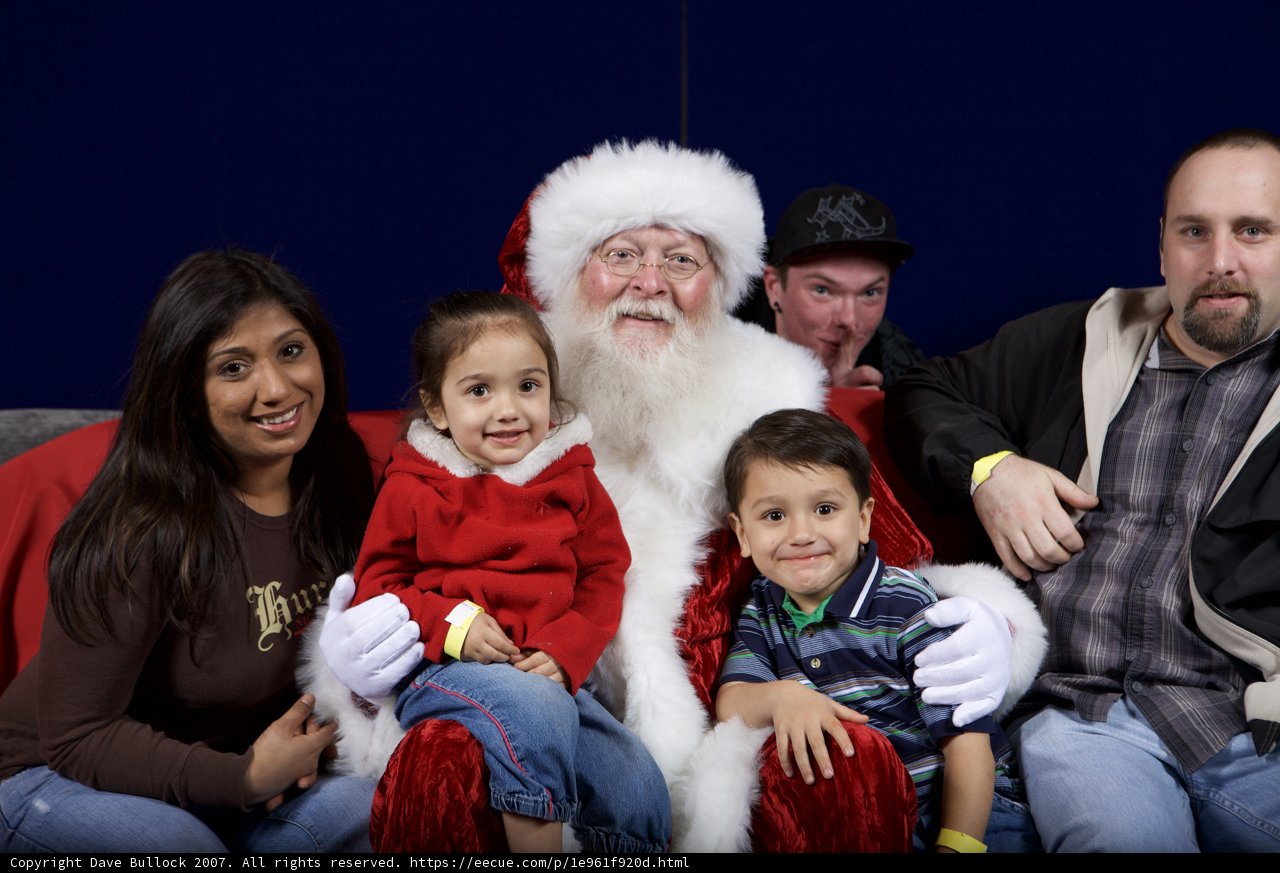 Family Christmas Photo with Santa Claus
