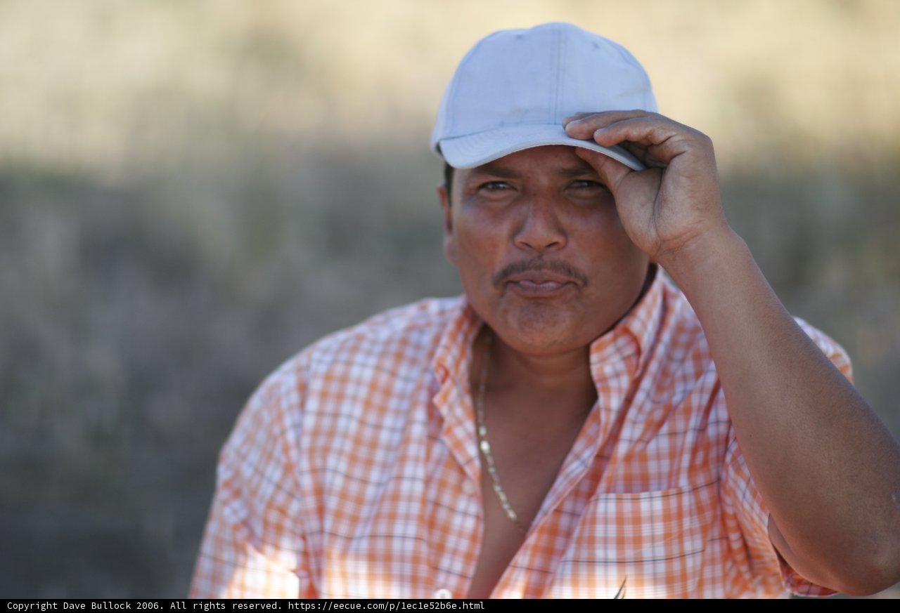 Stylish Man in a White Hat