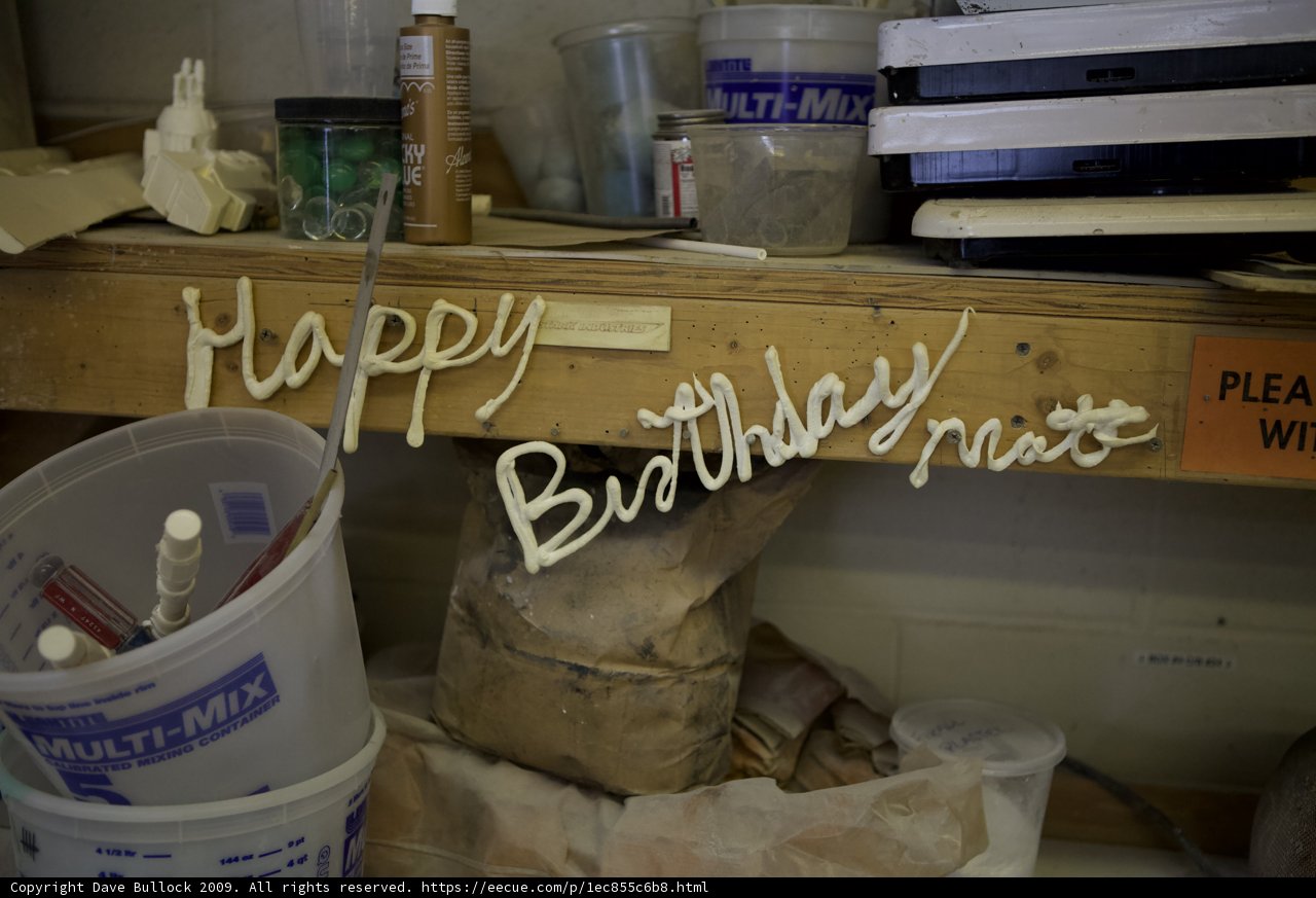 Birthday Sign and Paint Bucket on Wooden Shelf