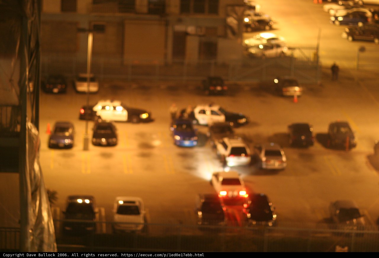 Police Car Patrols Parking Lot