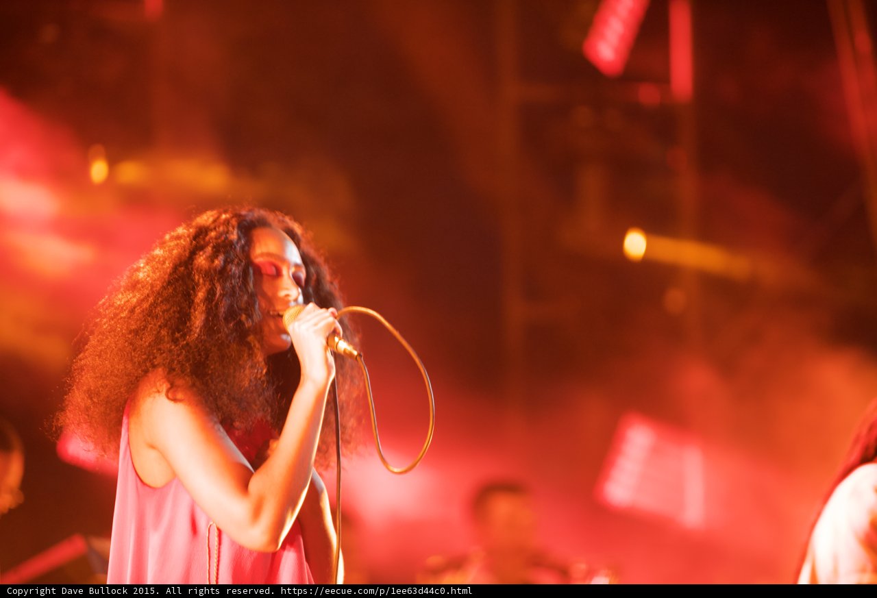 Solange Portrait Soft Smile Singing Spotlight Beam Red