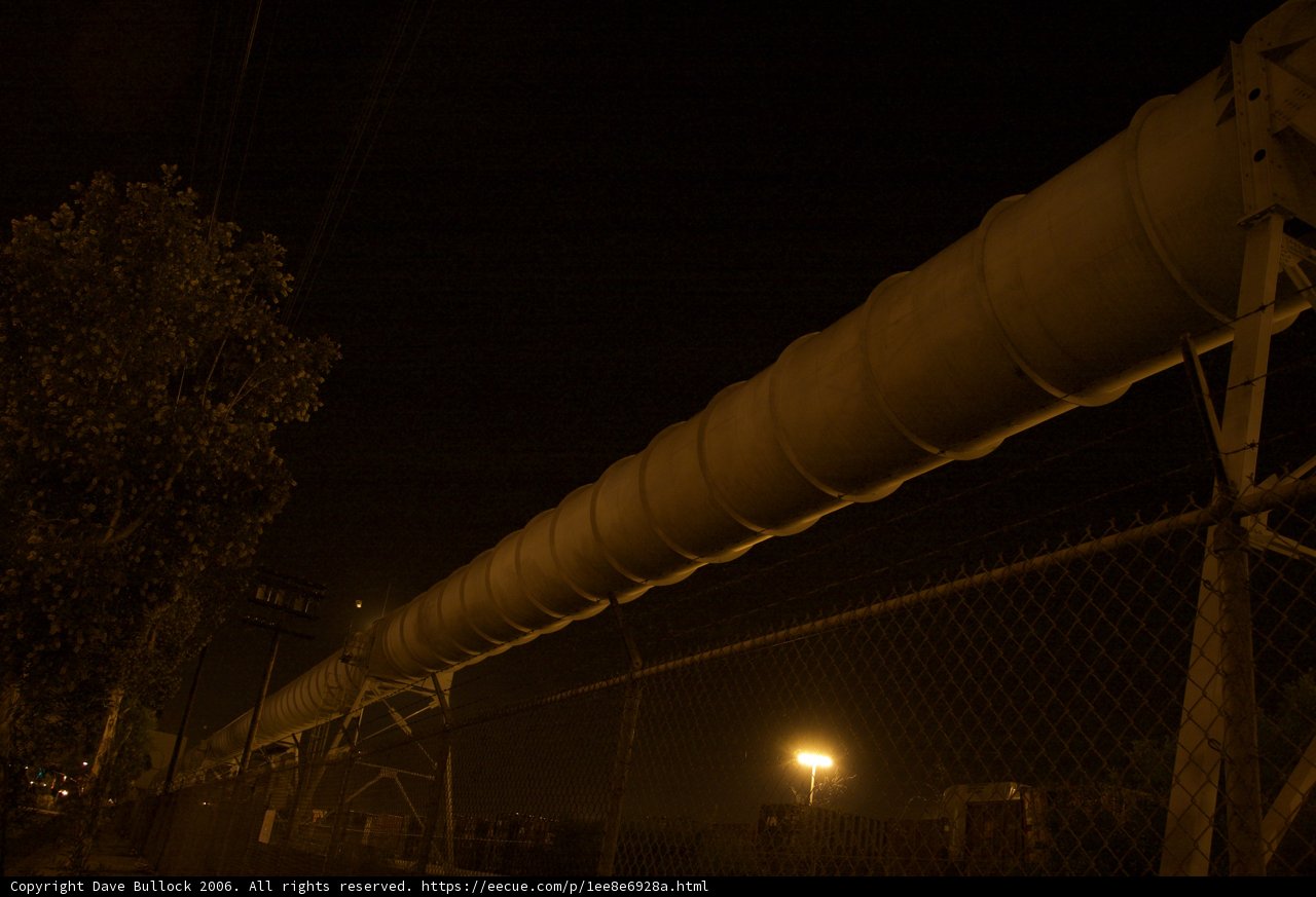 Industrial Pipeline at Night