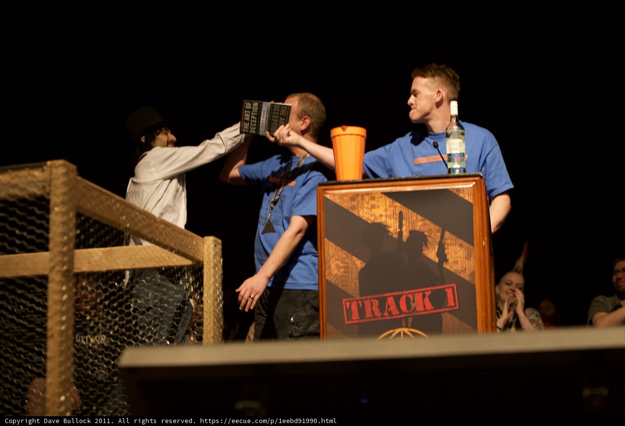 Two Men Take the Stage with Microphones