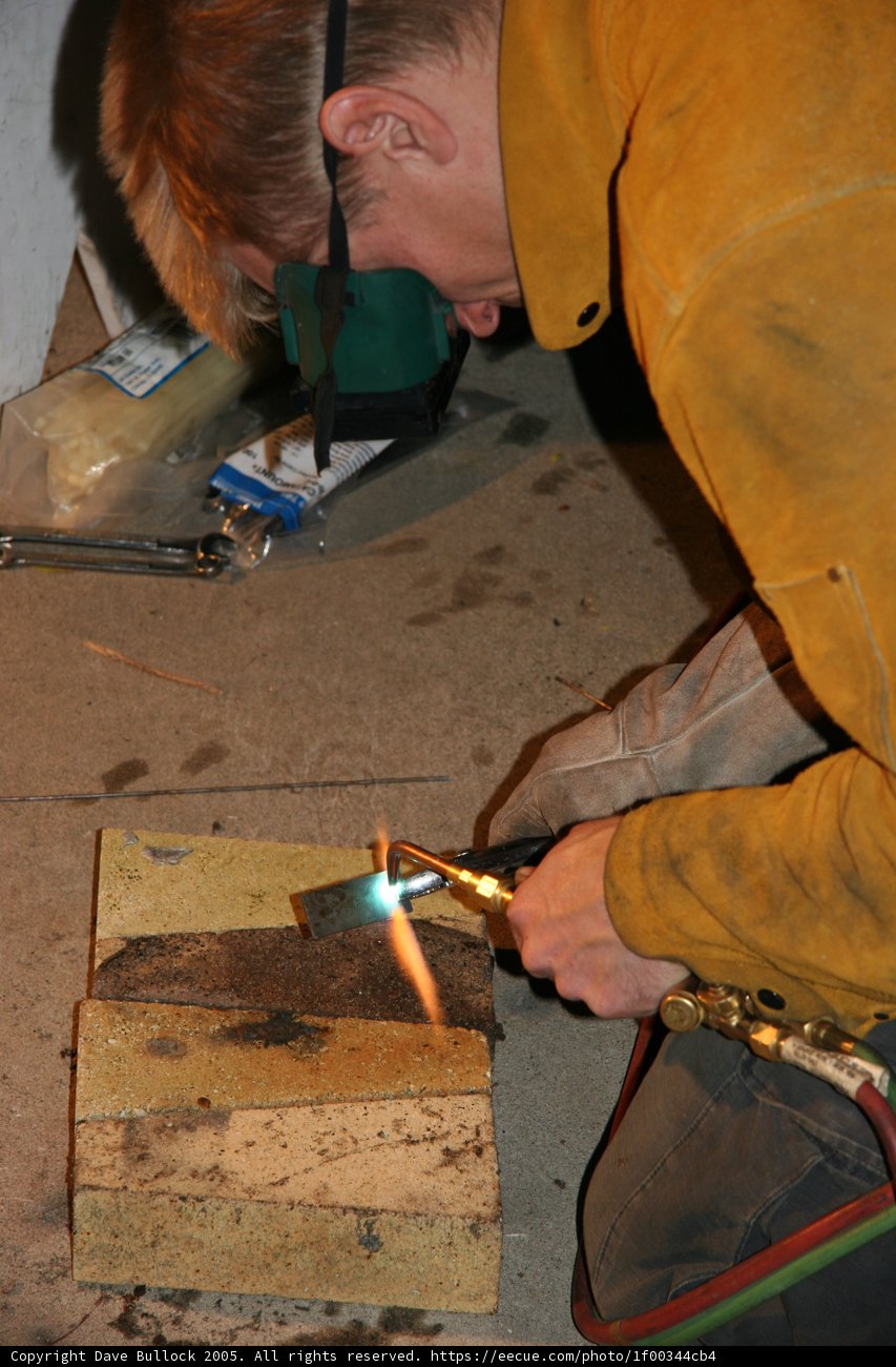 Man welding wood