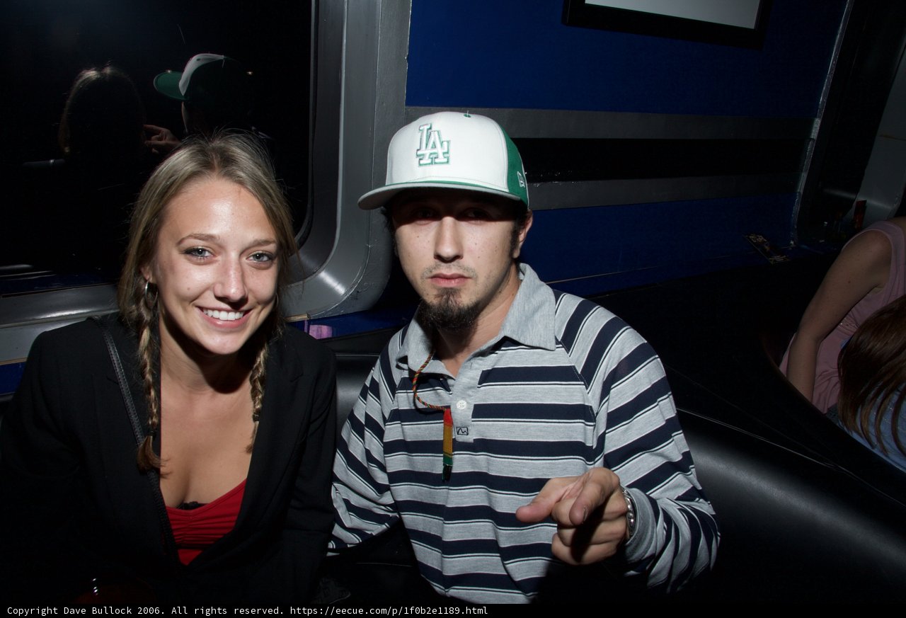 Partygoers in Hardhats and Baseball Caps