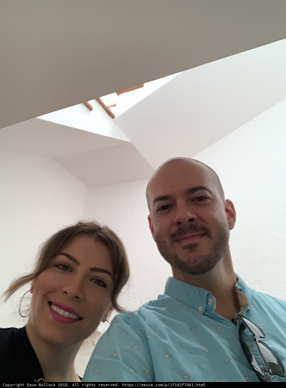 Happy Couple takes a Selfie indoors
