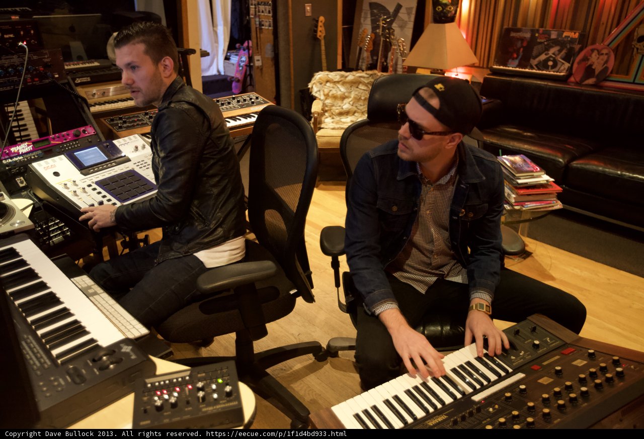 Recording Session with Two Men and Electronic Equipment