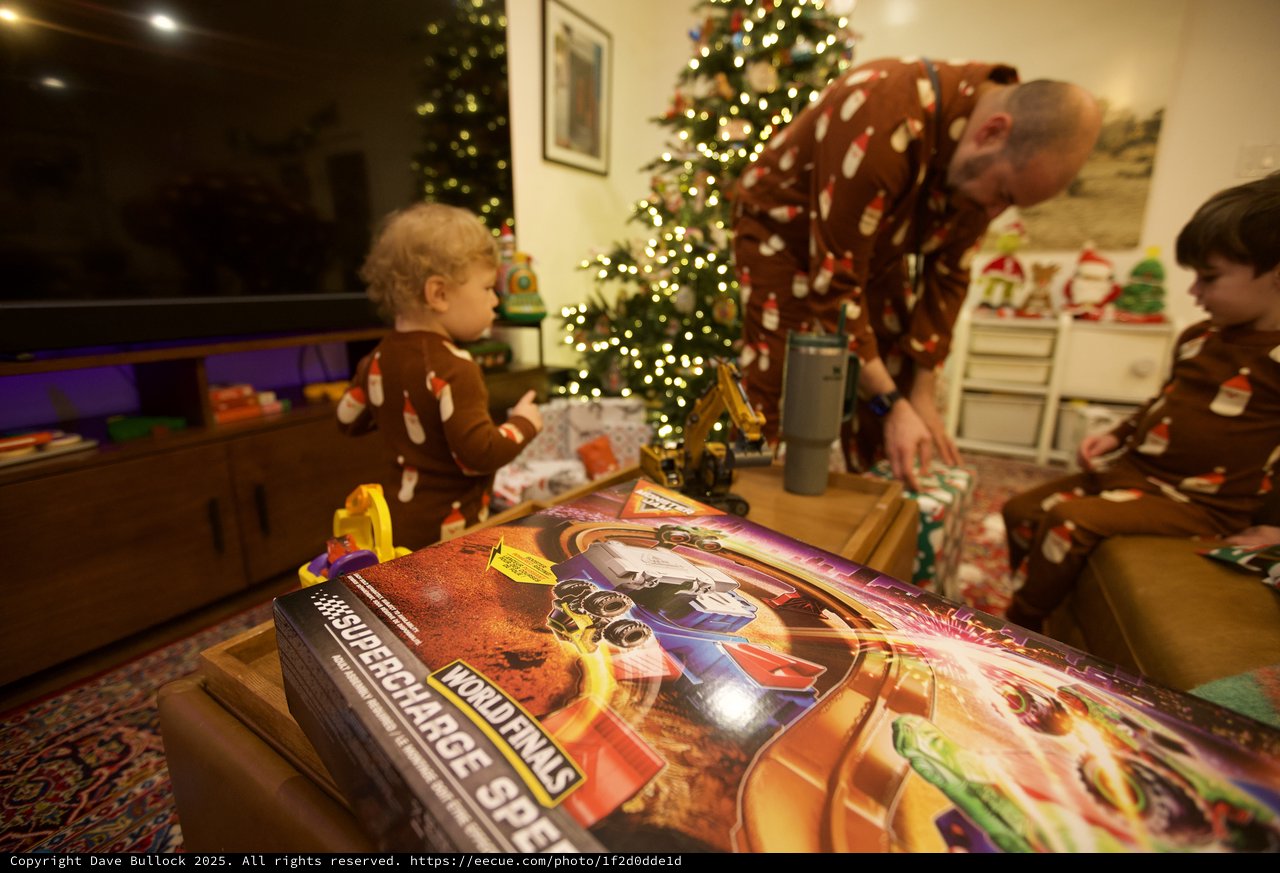 Christmas Morning Unwrapping Presents with Family
