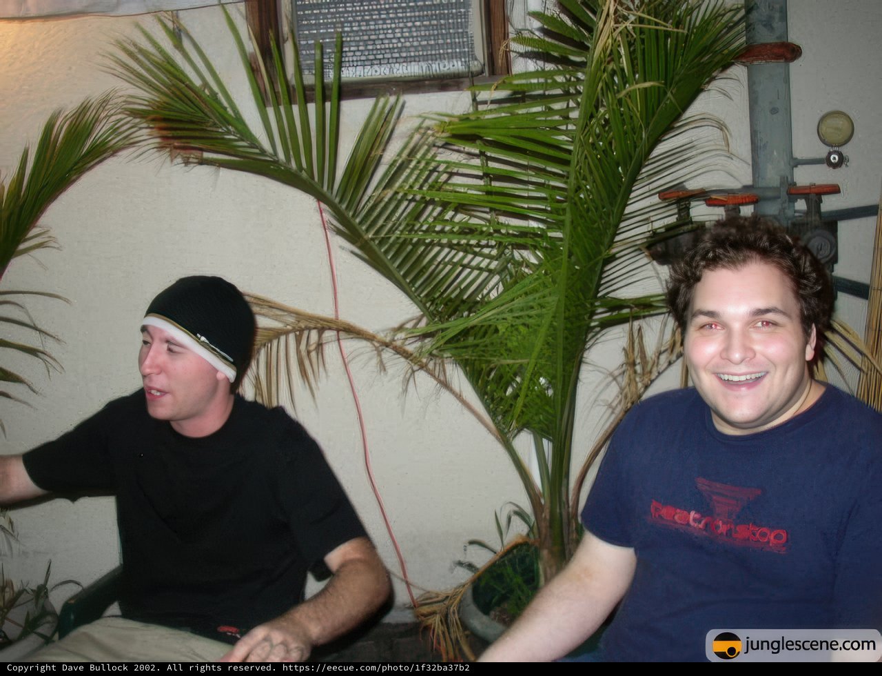 Two Men Enjoying Indoor Greenery