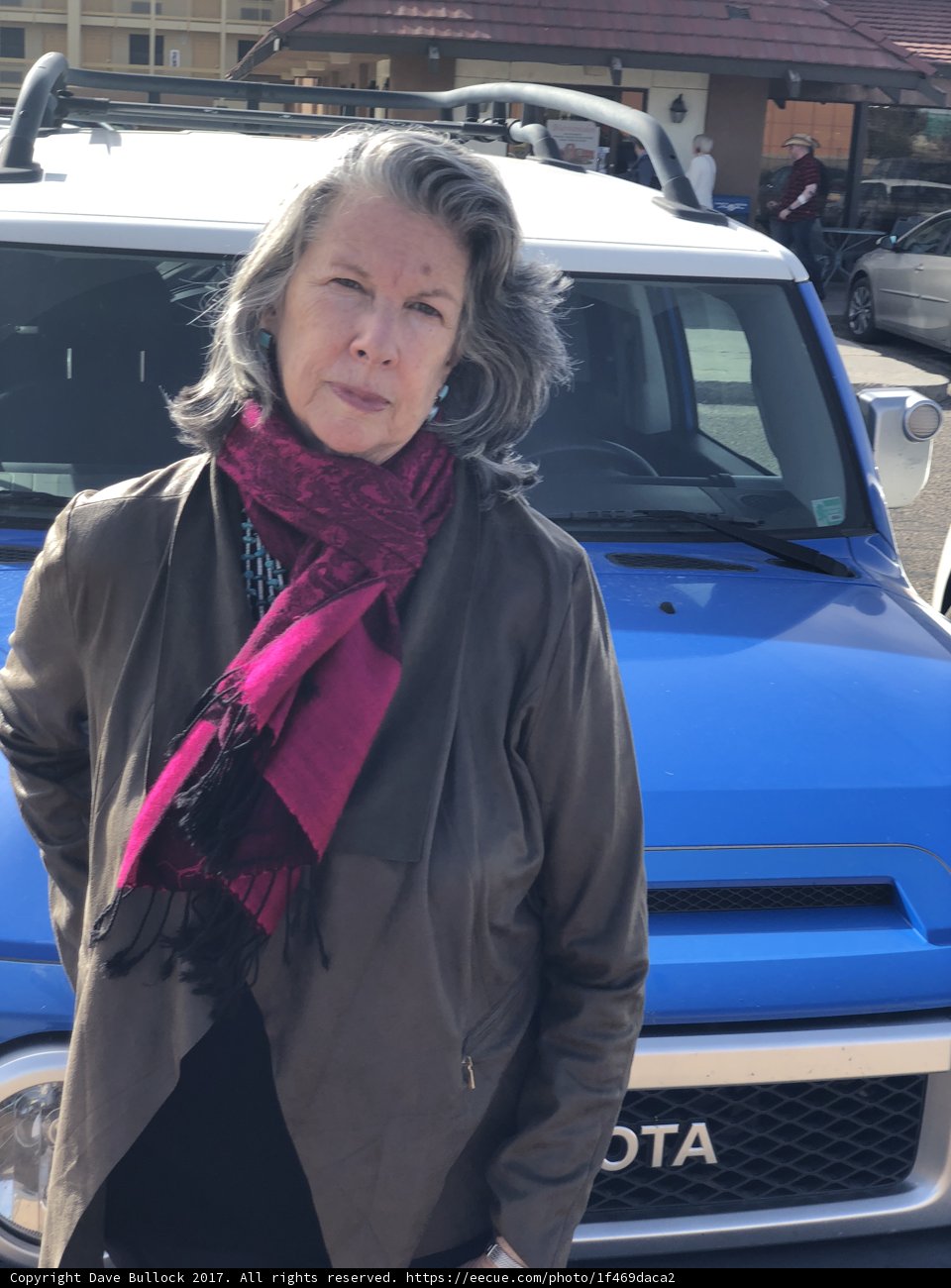Blue Toyota Truck and Its Owner